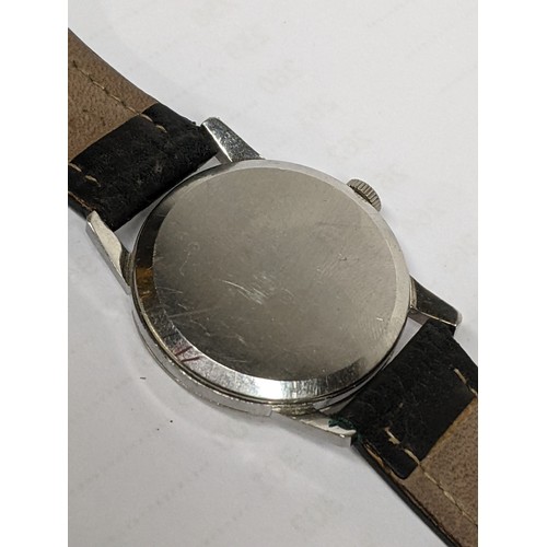 76 - An Omega, manual winding gents stainless steel wristwatch, having a textured dial with subsidiary se... 