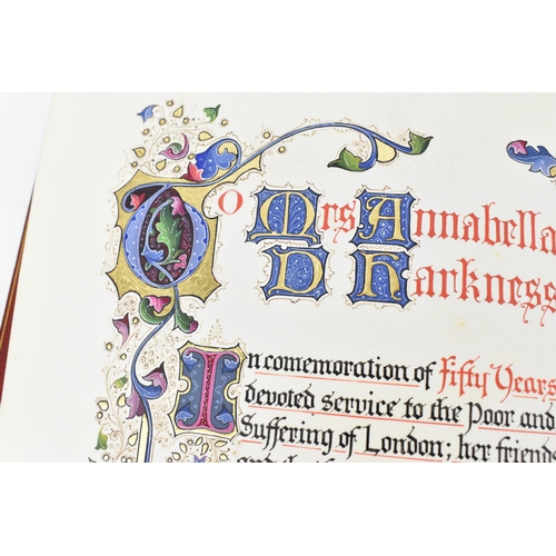 196 - An early 20th century tooled leather bound commemorative book, to honour the fifty year service of M... 