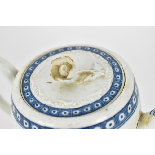 202 - A Worcester blue and white porcelain barrel shaped teapot, circa 1760, with flat cover surmounted wi... 