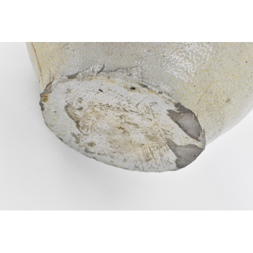 208 - A large German stoneware armorial Bellarmine, salt glazed, the mask with elongated beard above the o... 