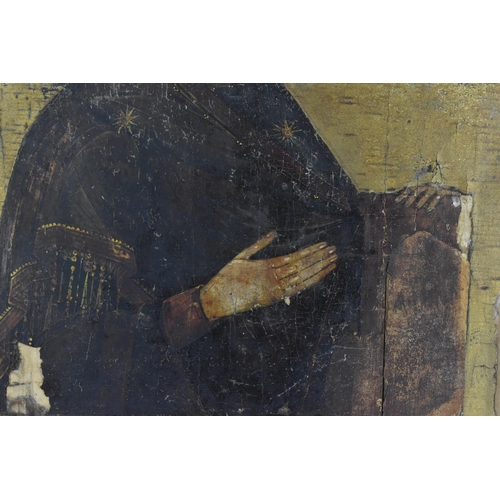 216 - A 19th century Russian icon of The Mother of God, with Cyrillic letters either side of her, tempura ... 