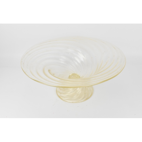 219 - An Italian Murano glass bowl designed by Archimede Seguso, circa 1970, the clear wrythen pattern wit... 