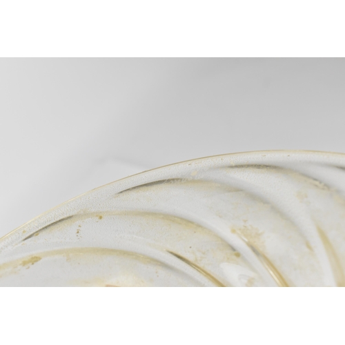 219 - An Italian Murano glass bowl designed by Archimede Seguso, circa 1970, the clear wrythen pattern wit... 