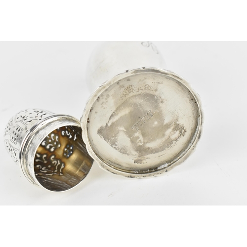 221 - A George V silver sugar sifter by Elkington & Co, Birmingham 1931, of baluster form with knopped fin... 