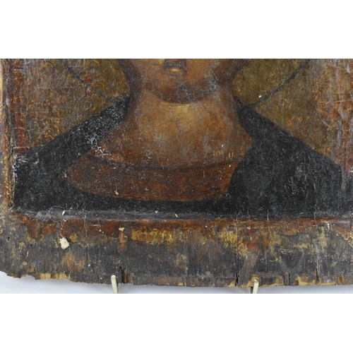 224 - A 19th century Russian icon of Christ, with Cyrillic letters either side of his halo, tempura on pan... 