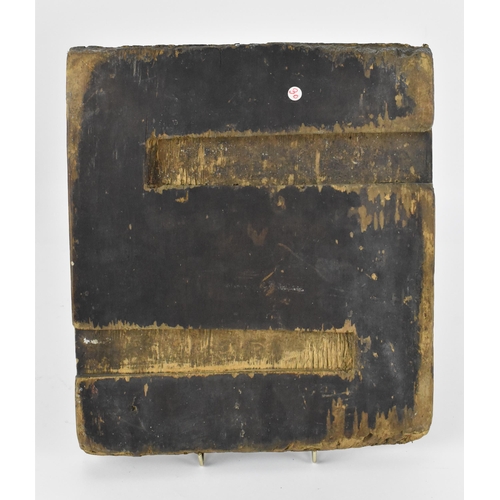 224 - A 19th century Russian icon of Christ, with Cyrillic letters either side of his halo, tempura on pan... 