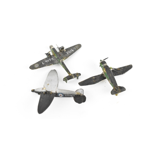 231 - Three WWII prisoner of war aircraft models, to include one of a black Spitfire K5054 prototype, a We... 