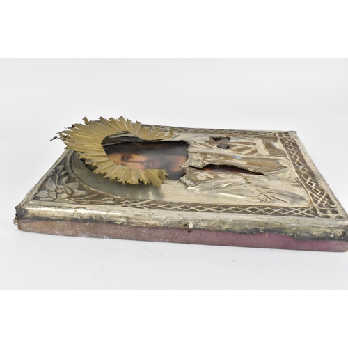 238 - A 19th century Russian icon of Christ Pantocrator, with brass and plated copper oklad, 27 cm x 22 cm