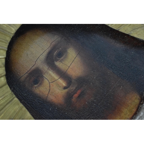 238 - A 19th century Russian icon of Christ Pantocrator, with brass and plated copper oklad, 27 cm x 22 cm