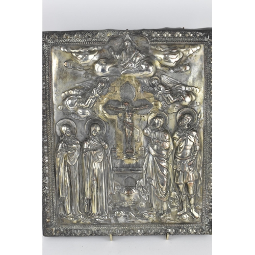 239 - A Russian silver plated copper icon of the Crucifixion of Christ, entirely cast relief of thin sheet... 