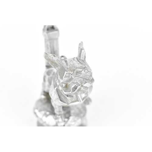 241 - An early 20th century Art Deco nikel plated bull dog car mascot, mounted on radiator cap, the dog de... 
