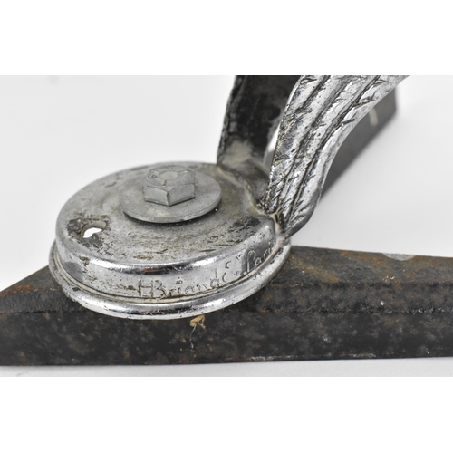 242 - An early 20th century French nikel plated car mascot by H. Briand, modelled as a winged woman with h... 