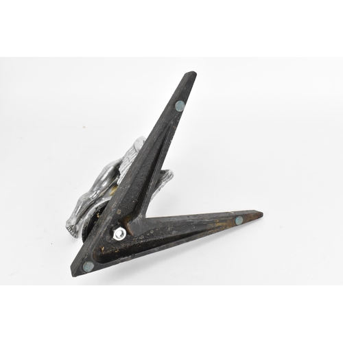 242 - An early 20th century French nikel plated car mascot by H. Briand, modelled as a winged woman with h... 