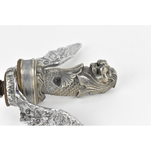 244 - A 20th century Singapore Merlion lion fish car mascot, with wings either side, the central part havi... 