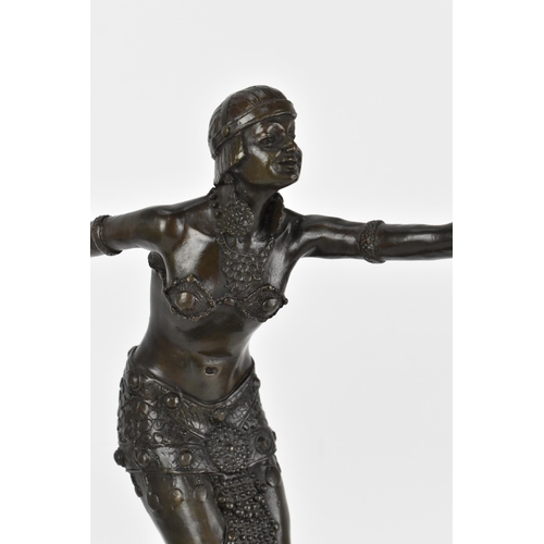 245 - After Demétre H. Chiparus (1886-1947), an Art Deco style bronze dancer on stand, with each arm stret... 