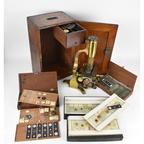 246 - A 19th century brass microscope by Salmon (100 Fenchurch St., London) in a mahogany box with brass f... 
