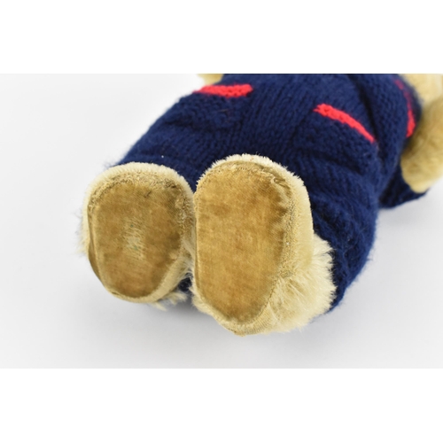 127 - A vintage Chiltern Ting-a-Ling teddy bear circa 1950's with orange and black eyes, short mohair muzz... 