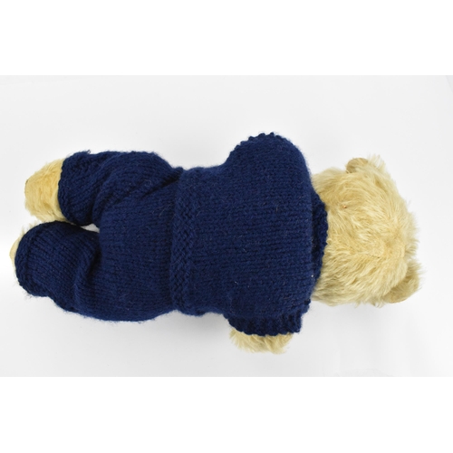 127 - A vintage Chiltern Ting-a-Ling teddy bear circa 1950's with orange and black eyes, short mohair muzz... 