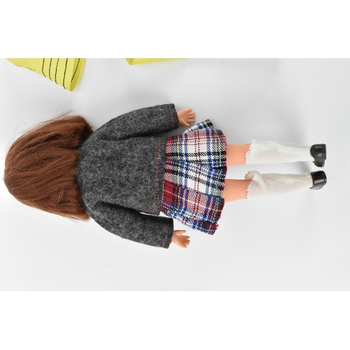 214 - A Pedigree Sindy early Patch brunette doll with painted eyebrows, eyes and lips, with freckles, wear... 