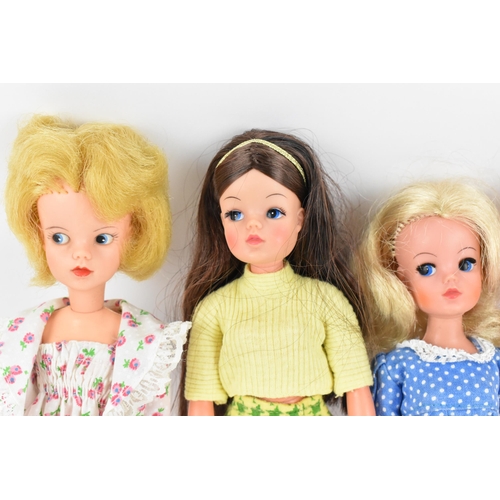 217 - A collection of four 1960s/70s Sindy dolls, in various outfits to include 'Ballet', 'Trendy', 'Bedti... 