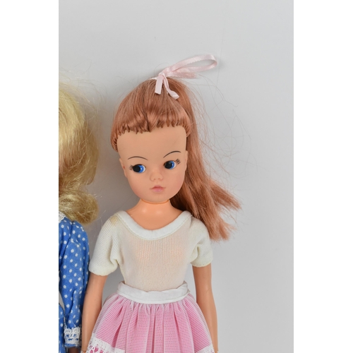 217 - A collection of four 1960s/70s Sindy dolls, in various outfits to include 'Ballet', 'Trendy', 'Bedti... 