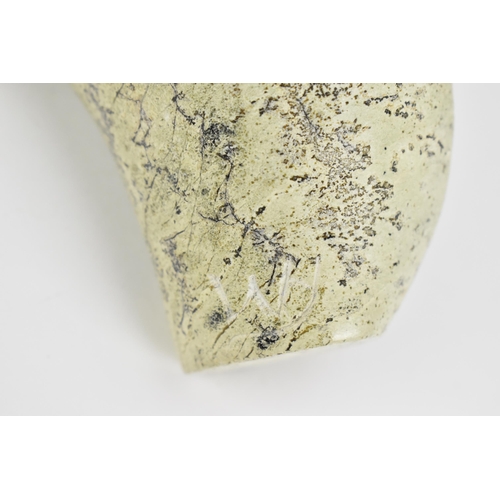 268 - A contemporary Zimbabwean carved verdite sculpture of a warrior, polished, with engraved initials to... 