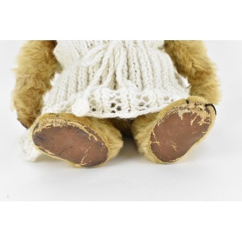 270 - A vintage Chiltern Ting-a-Ling teddy bear circa 1950's with orange and black glass eyes, short mohai... 