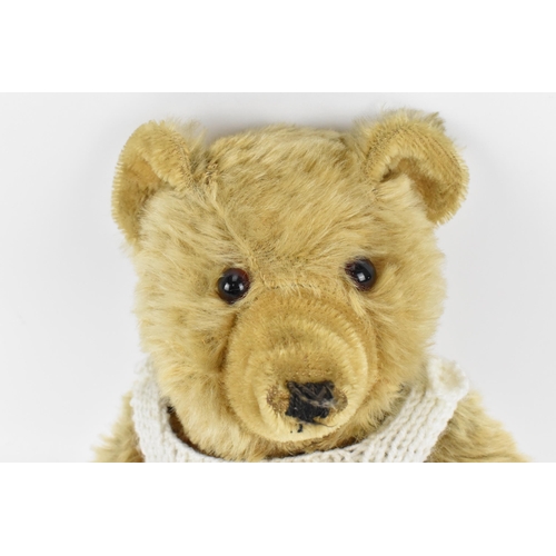 270 - A vintage Chiltern Ting-a-Ling teddy bear circa 1950's with orange and black glass eyes, short mohai... 