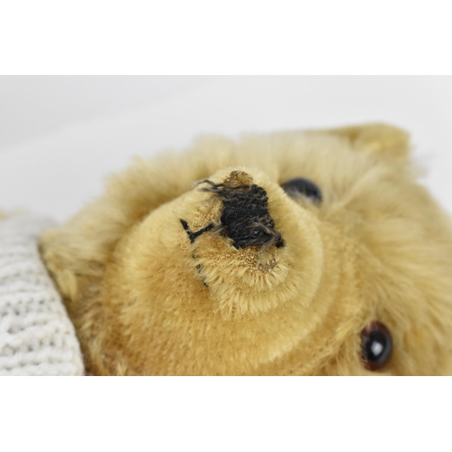 270 - A vintage Chiltern Ting-a-Ling teddy bear circa 1950's with orange and black glass eyes, short mohai... 