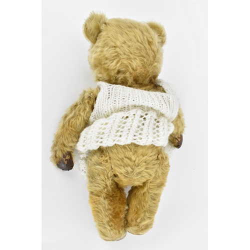 270 - A vintage Chiltern Ting-a-Ling teddy bear circa 1950's with orange and black glass eyes, short mohai... 