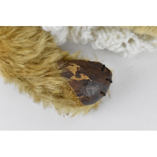 270 - A vintage Chiltern Ting-a-Ling teddy bear circa 1950's with orange and black glass eyes, short mohai... 