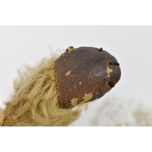 270 - A vintage Chiltern Ting-a-Ling teddy bear circa 1950's with orange and black glass eyes, short mohai... 