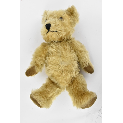 274 - A small collection of children's soft toys to include a Chiltern bear, with blonde mohair, stitched ... 