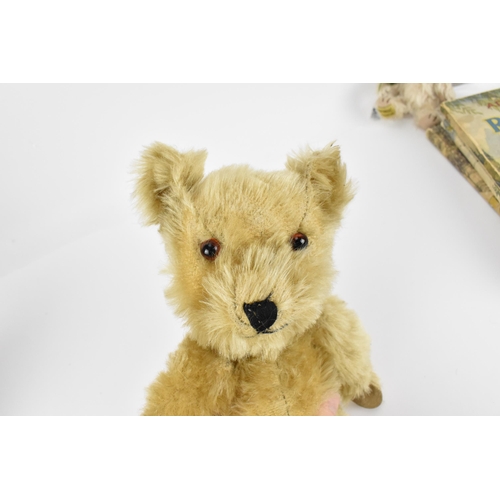 274 - A small collection of children's soft toys to include a Chiltern bear, with blonde mohair, stitched ... 