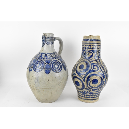 277 - Two German salt-glazed blue and white flagons, probably  18th century Westerwald, each of bulbous fo... 