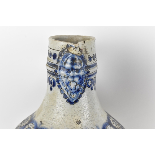 277 - Two German salt-glazed blue and white flagons, probably  18th century Westerwald, each of bulbous fo... 