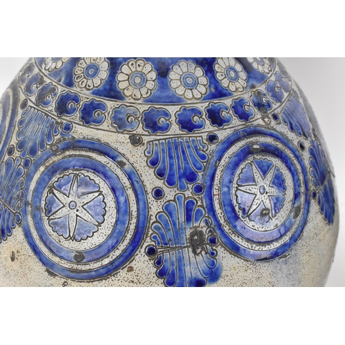 277 - Two German salt-glazed blue and white flagons, probably  18th century Westerwald, each of bulbous fo... 