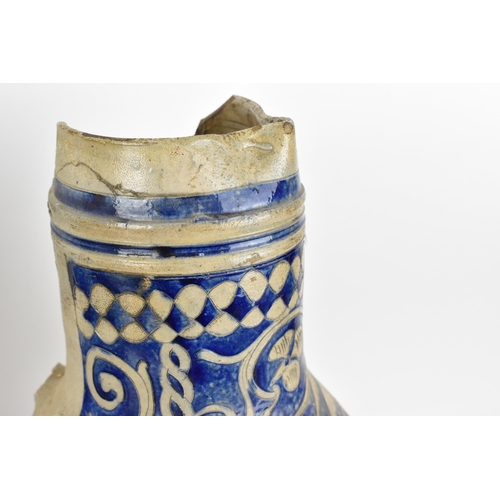 277 - Two German salt-glazed blue and white flagons, probably  18th century Westerwald, each of bulbous fo... 