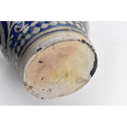 277 - Two German salt-glazed blue and white flagons, probably  18th century Westerwald, each of bulbous fo... 