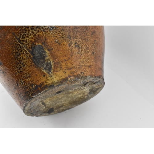 278 - A large German stoneware Bellarmine Bartmannskrug flagon, salt glazed, 17th century, with bearded ma... 