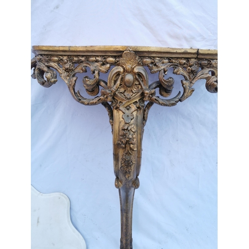 114 - A 19th century giltwood and marble console table and mirror, the table with shaped white marble top,... 