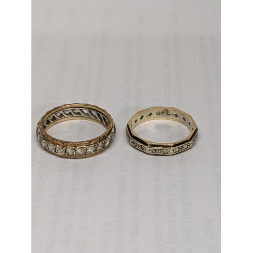 10 - Two 9ct gold eternity rings inset with white sapphires, total weight 7.1g
Location: RING