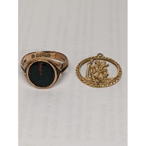 12 - A 9ct gold gents signet ring together with a 9ct gold St Christopher pendant, total weight 6.6g
Loca... 