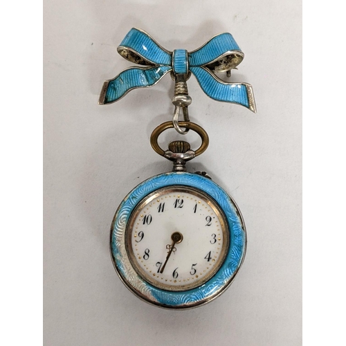 16 - A late 19th/early 20th century silver enamelled fob watch suspended on a matching bow brooch A/F
Loc... 