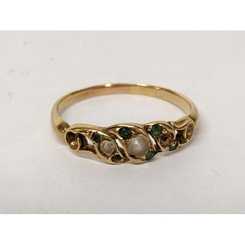 18 - A yellow metal ring inset with pearls and paste green stones, 2.2g
Location: RING