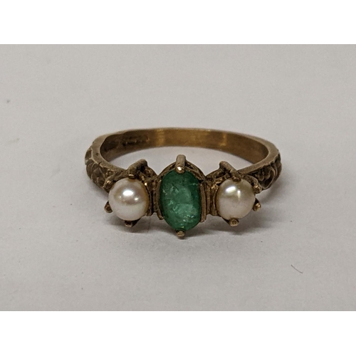 19 - A 9ct gold emerald ring flanked by two cultured pearls, 2.6g
Location: RING