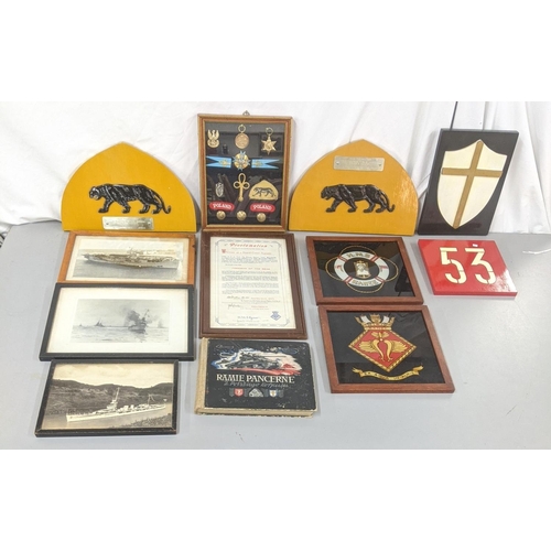 205 - A collection of WWII Polish related items to include photographs, medals, badges and a certificate f... 