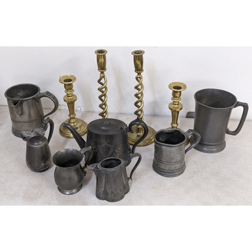 206 - Metalware to include 18th/19th century pewter jug, tankard, a pair of open twist candlesticks
Locati... 