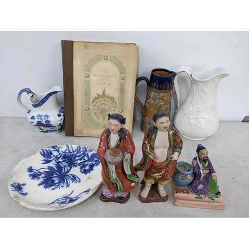 207 - 19th/20th century ceramics to include a pair of Japanese figures, jugs, book The Romance of the Jewe... 