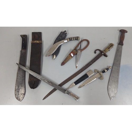 251 - A group of mixed 19th century and later edged weapons to include a French Chassepot bayonet A/F (wit... 